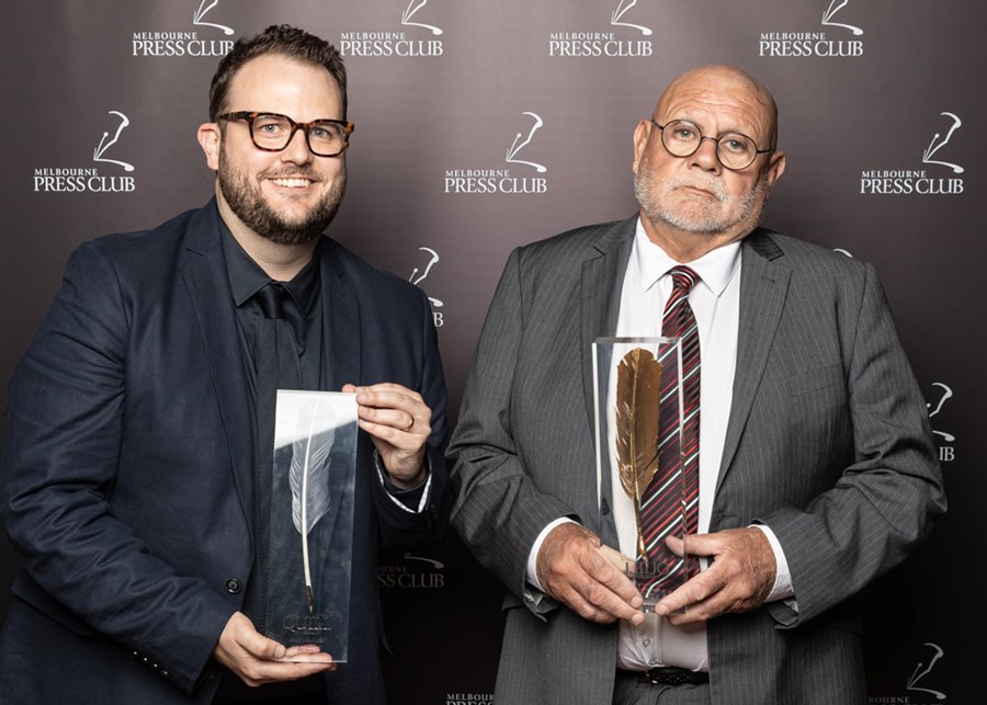 Russell Jackson and Robert Muir holding trophies at The Quills in March